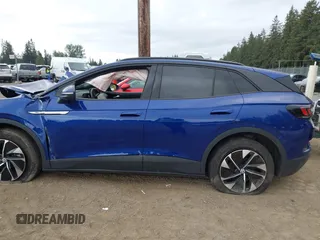2022 Volkswagen ID.4 Pro S z VIN WVGGNPE26NP036269, wystawiony jako IAAI lot #42279904 z przebiegiem 43 959 mil mil oraz . Historia ofert i sprzedaży dostępna na DreamBid. Obrazek 15.