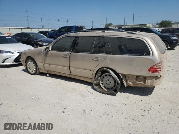 2003 Mercedes-Benz E-Class AWD with VIN WDBJH82J93X088042, listed as a Copart auction lot 70566864 with 167,374 mi miles and Salvage Title. Bid and sale history available at carsss.com. Image 2.