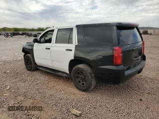 2017 Chevrolet Tahoe Commercial with VIN 1GNLCDEC4HR219881, listed as a Copart auction lot 50574145 with 115,700 mi miles and Salvage title. Bid and sale history available at DreamBid. Image 2.
