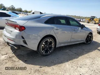 2022 Kia K5 GT-Line z VIN 5XXG64J22NG118478, wystawiony jako Copart lot #50174435 z przebiegiem 87 658 mil mil oraz Szkody całkowita. Historia ofert i sprzedaży dostępna na DreamBid. Obrazek 3.