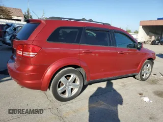 2009 Dodge Journey SXT with VIN 3D4GG57V19T150405, listed as a Copart auction lot 70817743 with 142,969 mi miles and Salvage Title. Bid and sale history available at carsss.com. Image 3.