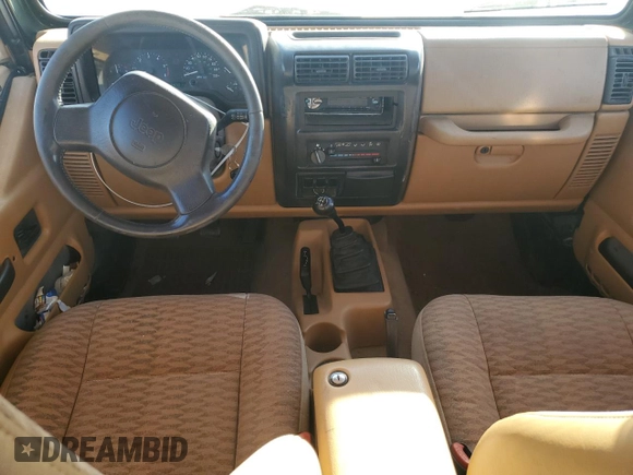 1998 Jeep Wrangler Sport with VIN 1J4FY19S0WP709843, listed as a Copart auction lot 74312254 with 147,010 mi miles and Salvage Title. Bid and sale history available at carsss.com. Image 8.
