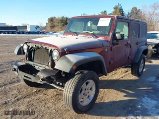 2008 Jeep Wrangler Unlimited X with VIN 1J4GA391X8L606077, listed as a IAAI auction lot 41419722 with 67,001 mi miles. Bid and sale history available at carsss.com. Image 18.