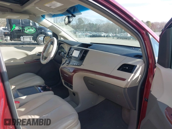 2014 Toyota Sienna XLE with VIN 5TDYK3DCXES442968, listed as a IAAI auction lot 41241310 with 132,020 mi miles and . Bid and sale history available at DreamBid. Image 5.