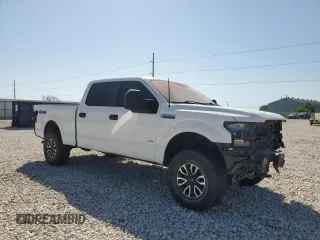 2015 Ford F-150 XLT w/HD Payload Pkg with VIN 1FTFW1EG6FFA02457, listed as a Copart auction lot 52121515 with 242,747 mi miles and Salvage Title. Bid and sale history available at carsss.com. Image 4.