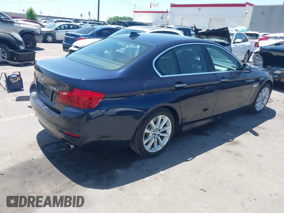 2016 BMW 5 Series 535i xDrive with VIN WBA5B3C59GG256290, listed as a IAAI auction lot 42381402 with 82,299 mi miles and . Bid and sale history available at DreamBid. Image 4.