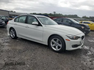 2014 BMW 3 Series 320i xDrive with VIN WBA3C3G50ENS67198, listed as a Copart auction lot 61654205 with 86,126 mi miles and Salvage title. Bid and sale history available at DreamBid. Image 4.