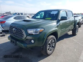2021 Toyota Tacoma SR z VIN 3TMCZ5AN7MM395940, wystawiony jako IAAI lot #41860127 z przebiegiem 39 338 mil mil oraz . Historia ofert i sprzedaży dostępna na DreamBid. Obrazek 17.