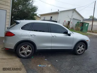 2012 Porsche Cayenne S Hybrid with VIN WP1AE2A2XCLA90082, listed as a IAAI auction lot 41960714 with 139,081 mi miles. Bid and sale history available at carsss.com. Image 14.
