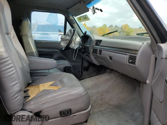 1994 Ford Bronco Custom with VIN 1FMEU15H7RLA79348, listed as a Copart auction lot 76497714 with 204,875 mi miles and Salvage Title. Bid and sale history available at DreamBid. Image 7.
