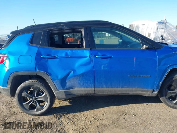2021 Jeep Compass Latitude z VIN 3C4NJDBB7MT592742, wystawiony jako IAAI lot #41677701 z przebiegiem 84 428 mil mil oraz . Historia ofert i sprzedaży dostępna na DreamBid. Obrazek 13.