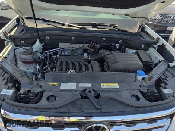 2023 Volkswagen Atlas SE z VIN 1V2HR2CA4PC526289, wystawiony jako IAAI lot #42734426 z przebiegiem 46 454 mil mil oraz . Historia ofert i sprzedaży dostępna na DreamBid. Obrazek 26.
