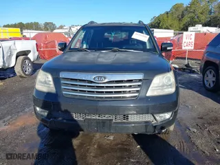 2009 Kia Borrego EX with VIN KNDJJ742X95034968, listed as a IAAI auction lot 41411206 with 146,584 mi miles. Bid and sale history available at carsss.com. Image 6.