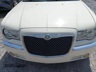 2010 Chrysler 300 C Hemi with VIN 2C3CA6CT6AH114461, listed as a IAAI auction lot 41779993 with 126,898 mi miles and . Bid and sale history available at carsss.com. Image 6.