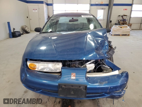 2001 Saturn SL z VIN 1G8ZK52791Z210421, wystawiony jako Copart lot #48808595 z przebiegiem 98 960 mil mil oraz Szkoda całkowita • Salvage title. Historia ofert i sprzedaży dostępna na DreamBid. Obrazek 5.