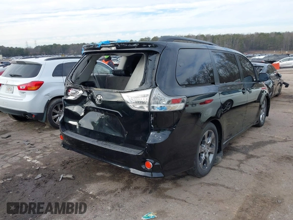 2011 Toyota Sienna SE with VIN 5TDXK3DCXBS112867, listed as a IAAI auction lot 41394925 with 235,567 mi miles. Bid and sale history available at carsss.com. Image 4.