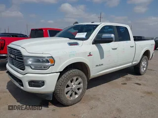 2022 Ram 2500 Laramie with VIN 3C6UR5FL0NG143918, listed as a IAAI auction lot 42373907 with 91,918 mi miles and . Bid and sale history available at DreamBid. Image 2.