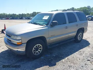 2001 Chevrolet Tahoe LS with VIN 1GNEK13T41R130752, listed as a IAAI auction lot 41966288 with 304,851 mi miles. Bid and sale history available at carsss.com. Image 2.