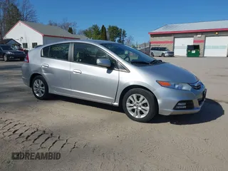 2013 Honda Insight EX z VIN JHMZE2H70DS005200, wystawiony jako IAAI lot #42105624 z przebiegiem 108 949 mil mil oraz . Historia ofert i sprzedaży dostępna na DreamBid. Obrazek 1.