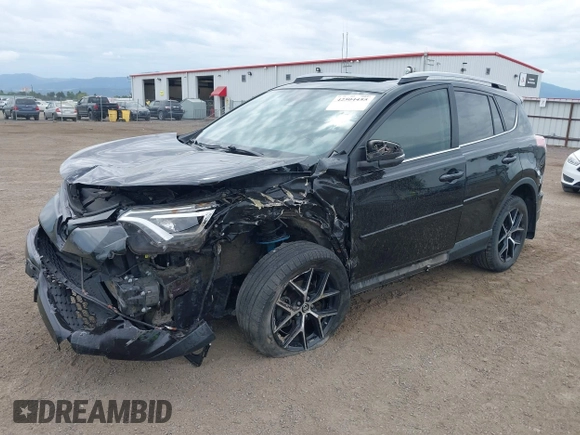 2018 Toyota RAV4 SE with VIN 2T3JFREV1JW730203, listed as a IAAI auction lot 42504455 with 99,442 mi miles and . Bid and sale history available at DreamBid. Image 2.