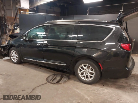 2020 Chrysler Pacifica Touring L with VIN 2C4RC1BG2LR280156, listed as a IAAI auction lot 42182406 with 105,038 mi miles and . Bid and sale history available at DreamBid. Image 3.