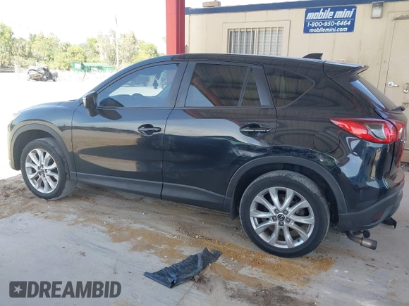 2015 Mazda CX-5 Grand Touring with VIN JM3KE4DY7F0481883, listed as a IAAI auction lot 42091709 with 184,248 mi miles and . Bid and sale history available at DreamBid. Image 15.