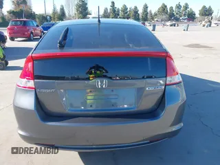 2010 Honda Insight LX with VIN JHMZE2H50AS019740, listed as a IAAI auction lot 41665527 with 74,022 mi miles and . Bid and sale history available at DreamBid. Image 16.