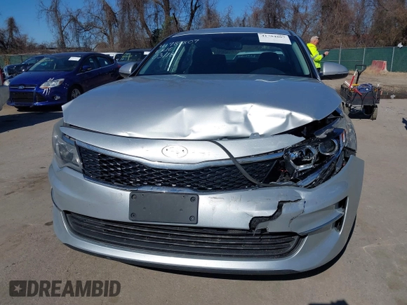 2016 Kia Optima LX with VIN 5XXGT4L37GG084538, listed as a IAAI auction lot 41784807 with 128,928 mi miles. Bid and sale history available at carsss.com. Image 6.