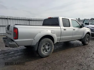 2004 Nissan Frontier XE with VIN 1N6ED29X94C415650, listed as a Copart auction lot 42880085 with 148,907 mi miles and Salvage title. Bid and sale history available at DreamBid. Image 3.