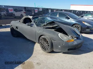 1998 Porsche Boxster z VIN WP0CA2982WU621935, wystawiony jako IAAI lot #41838363 z przebiegiem Nie podano mil oraz . Historia ofert i sprzedaży dostępna na DreamBid. Obrazek 1.