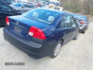 2004 Honda Civic LX with VIN 2HGES15564H516764, listed as a IAAI auction lot 40933100 with 107,000 mi miles. Bid and sale history available at carsss.com. Image 4.