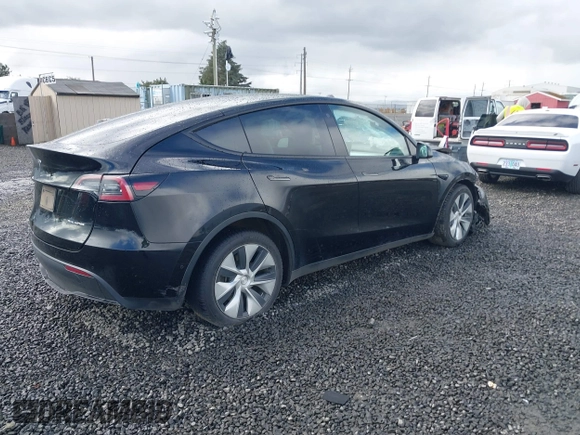 2022 Tesla Model Y Long Range z VIN 7SAYGDEE4NF447985, wystawiony jako IAAI lot #41811782 z przebiegiem 81 973 mil mil oraz . Historia ofert i sprzedaży dostępna na DreamBid. Obrazek 4.