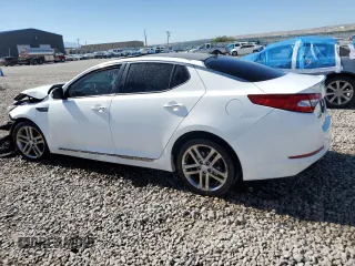 2013 Kia Optima SX with VIN 5XXGR4A60DG213906, listed as a Copart auction lot 60121165 with 121,559 mi miles and Salvage title. Bid and sale history available at DreamBid. Image 2.