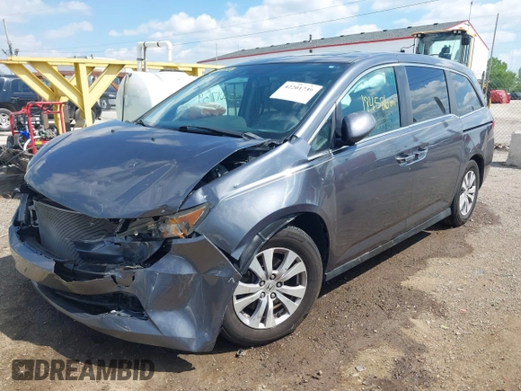 2014 Honda Odyssey EX-L with VIN 5FNRL5H60EB117218, listed as a IAAI auction lot 42201739 with 184,586 mi miles and . Bid and sale history available at DreamBid. Image 6.