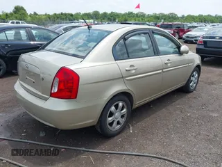 2006 Hyundai Accent GLS with VIN KMHCN46C26U037605, listed as a IAAI auction lot 42431996 with 86,128 mi miles and . Bid and sale history available at DreamBid. Image 4.