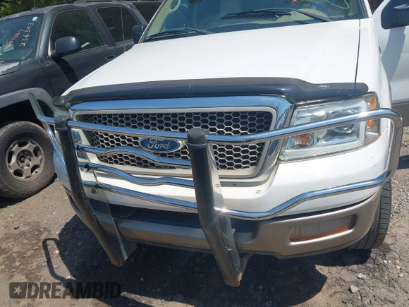2004 Ford F-150 XLT with VIN 1FTPW12504KC34452, listed as a IAAI auction lot 42051599 with 215,857 mi miles. Bid and sale history available at carsss.com. Image 6.