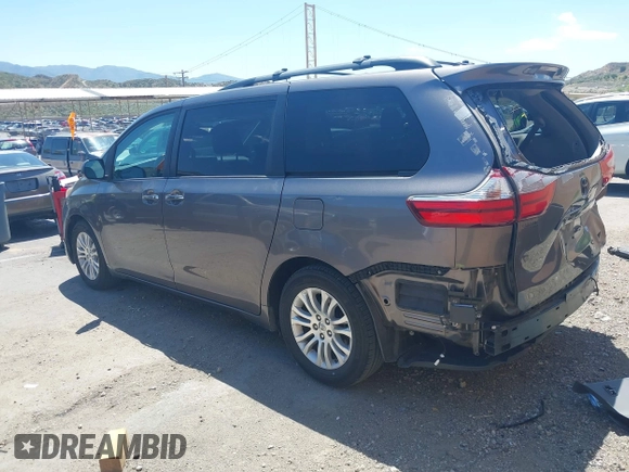 2016 Toyota Sienna XLE with VIN 5TDYK3DCXGS722960, listed as a IAAI auction lot 42153794 with 147,331 mi miles. Bid and sale history available at carsss.com. Image 3.
