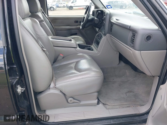 2004 Chevrolet Tahoe Z71 with VIN 1GNEK13ZX4R184775, listed as a IAAI auction lot 42433671 with 77,019 mi miles and . Bid and sale history available at DreamBid. Image 5.