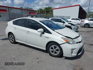 2015 Toyota Prius Four z VIN JTDKN3DU5F0463995, wystawiony jako IAAI lot #42189475 z przebiegiem 152 585 mil mil oraz . Historia ofert i sprzedaży dostępna na DreamBid. Obrazek 1.