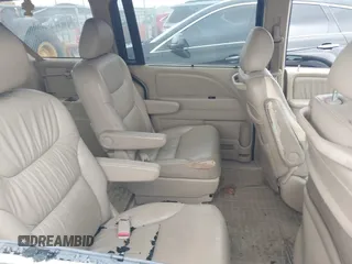 2007 Honda Odyssey EX-L z VIN 5FNRL38717B102646, wystawiony jako IAAI lot #42380196 z przebiegiem 234 088 mil mil oraz . Historia ofert i sprzedaży dostępna na DreamBid. Obrazek 8.