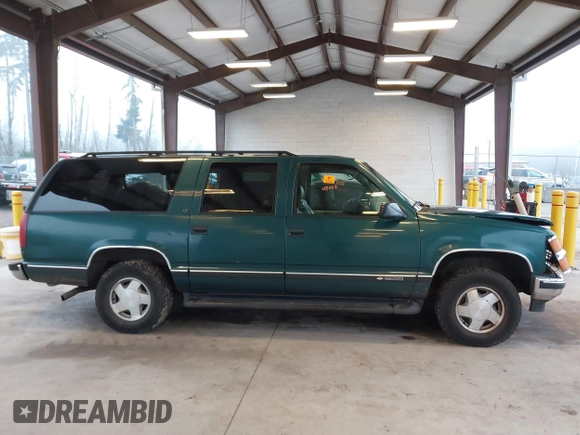 1997 Chevrolet Suburban with VIN 3GNFK16R6VG118242, listed as a IAAI auction lot 41349416 with 183,439 mi miles. Bid and sale history available at carsss.com. Image 13.