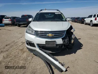 2017 Chevrolet Traverse LT with VIN 1GNKRGKDXHJ292633, listed as a Copart auction lot 49739035 with 76,439 mi miles and Salvage Title. Bid and sale history available at DreamBid. Image 5.
