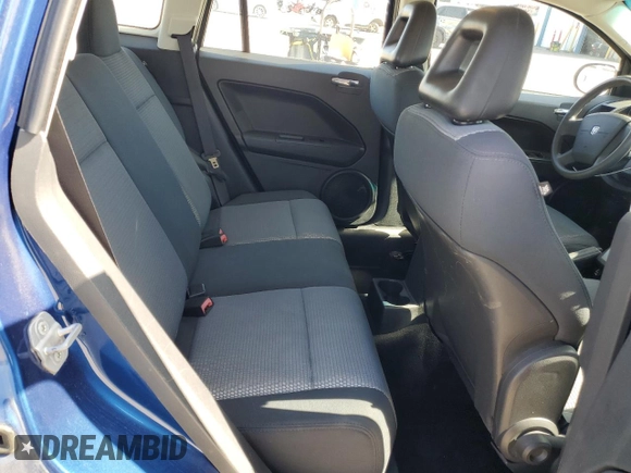 2009 Dodge Caliber SXT with VIN 1B3HB48A99D157051, listed as a Copart auction lot 52098965 with 188,268 mi miles and Salvage Title. Bid and sale history available at carsss.com. Image 10.