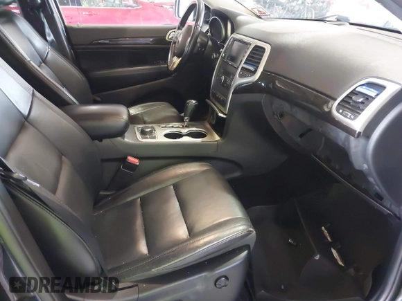 2012 Jeep Grand Cherokee Laredo with VIN 1C4RJFAT8CC182128, listed as a IAAI auction lot 40154044 with 239,601 mi miles. Bid and sale history available at carsss.com. Image 5.