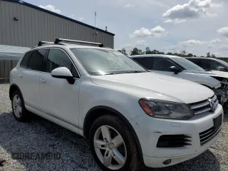 2013 Volkswagen Touareg z VIN WVGEG9BP7DD001849, wystawiony jako Copart lot #60208005 z przebiegiem 120 741 mil mil oraz Czysty tytuł • Clean title. Historia ofert i sprzedaży dostępna na DreamBid. Obrazek 4.