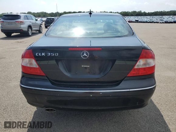 2007 Mercedes-Benz CLK 350 with VIN WDBTJ56H77F230404, listed as a Copart auction lot 65291925 with 128,021 mi miles and Salvage title. Bid and sale history available at DreamBid. Image 6.