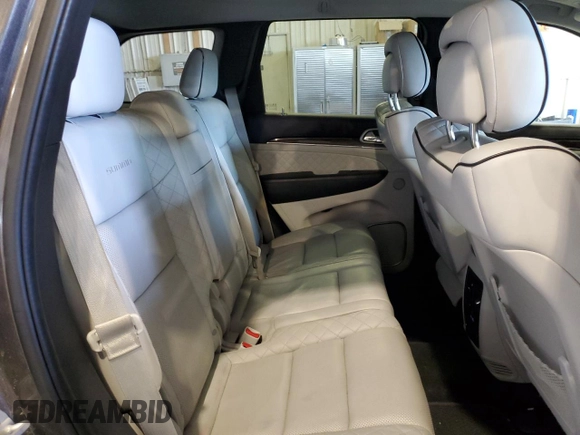 2017 Jeep Grand Cherokee Summit with VIN 1C4RJFJT4HC723876, listed as a Copart auction lot 52647205 with 97,412 mi miles and Salvage title. Bid and sale history available at DreamBid. Image 11.