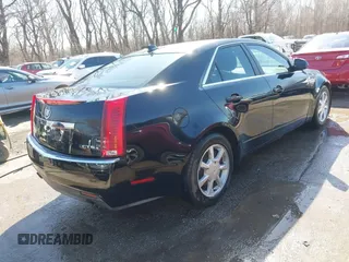 2009 Cadillac CTS AWD z VIN 1G6DH577290166448, wystawiony jako IAAI lot #41751610 z przebiegiem 158 378 mil mil oraz . Historia ofert i sprzedaży dostępna na DreamBid. Obrazek 4.