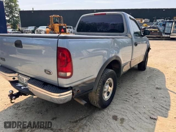 1998 Ford F-150 with VIN 1FTZF1824WNB36564, listed as a Copart auction lot 61681655 with 176,134 mi miles and Clean title. Bid and sale history available at DreamBid. Image 4.