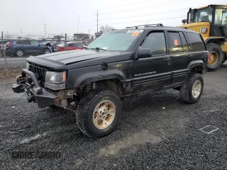 1998 Jeep Grand Cherokee Laredo with VIN 1J4GZ48S0WC171138, listed as a Copart auction lot 85502794 with 0 mi miles and Salvage Title. Bid and sale history available at carsss.com. Image 1.